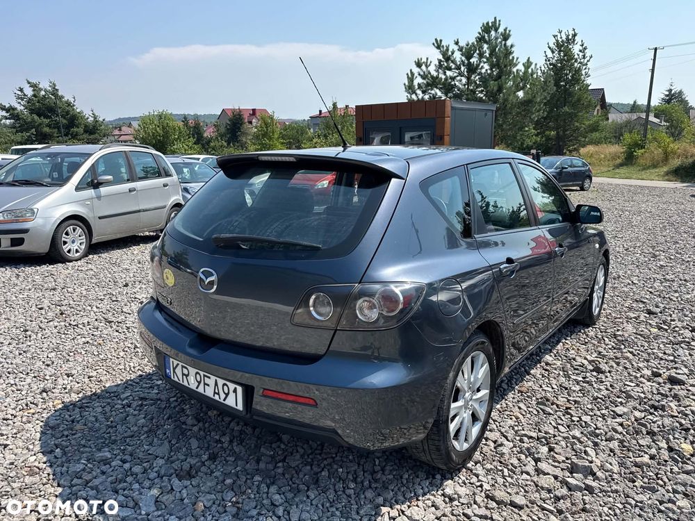Mazda 3 1.6 Exclusive + - 2