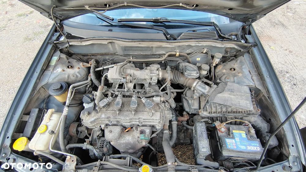 Nissan Almera 1.5 Visia + - 18