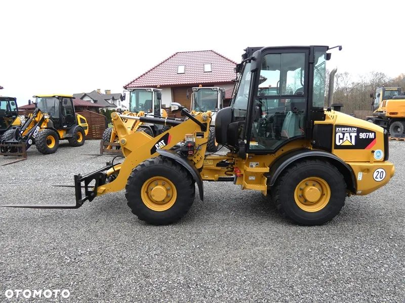 Caterpillar 907M Z Niemiec / Klima / Centralne Smarowanie / - 1