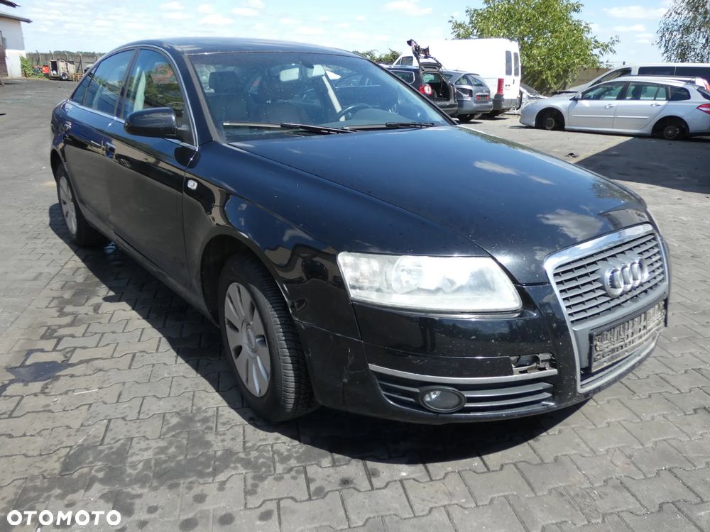AUDI A6 C6*SAMOCHÓD NA CZĘŚCI*LY9B/A2A2/L041 ( Brilliant Black )/SKRZYNIA, MASKA, LAMPA, DRZWI, LUSTERKO, ZDERZAK, GRILL, BŁOTNIK, KLAPA, BELKA, FOTELE, KANAPA, ĆWIARTKA KIEROWNICA, ZAWIESZENIE, LICZNIK, ZEGARY, - 1