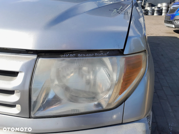 MITSUBISHI PAJERO PININ LAMPA REFLEKTOR LEWA PRZEDNIA LEWY PRZÓD