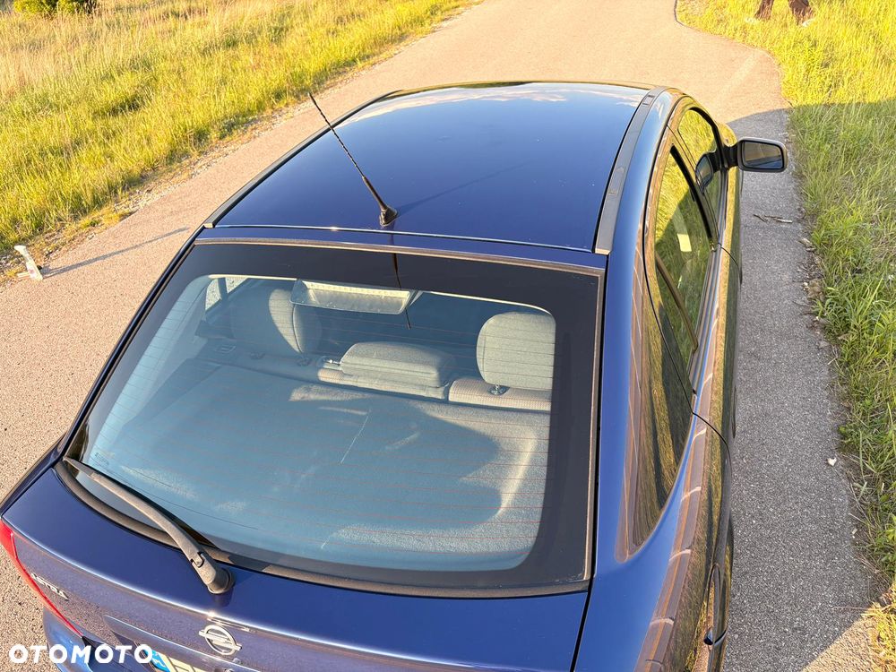 Opel Astra 1.8 Sport - 12