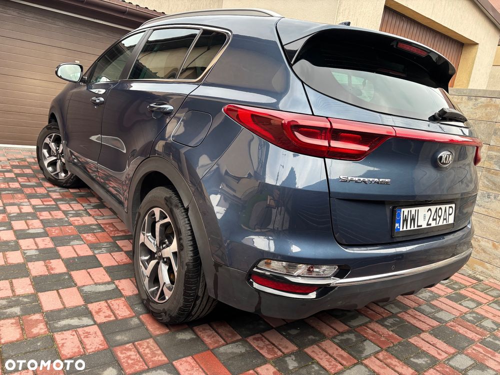 Kia Sportage - 4