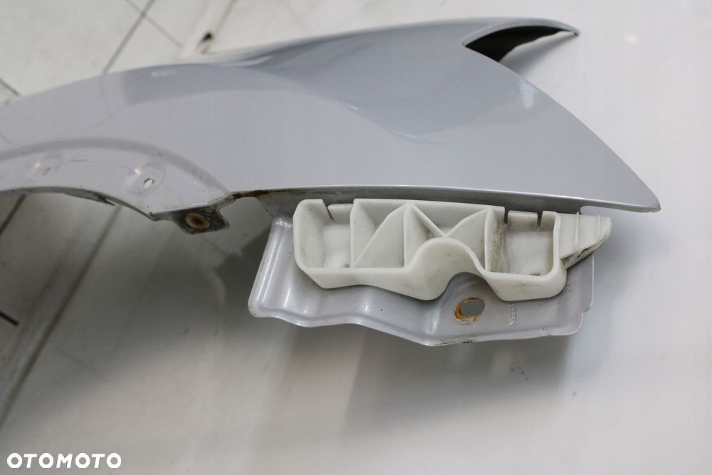 BŁOTNIK PRAWY PRZÓD PRZEDNI NISSAN QASHQAI I J10 2006R- K54 - KOD LAKIERU - 6