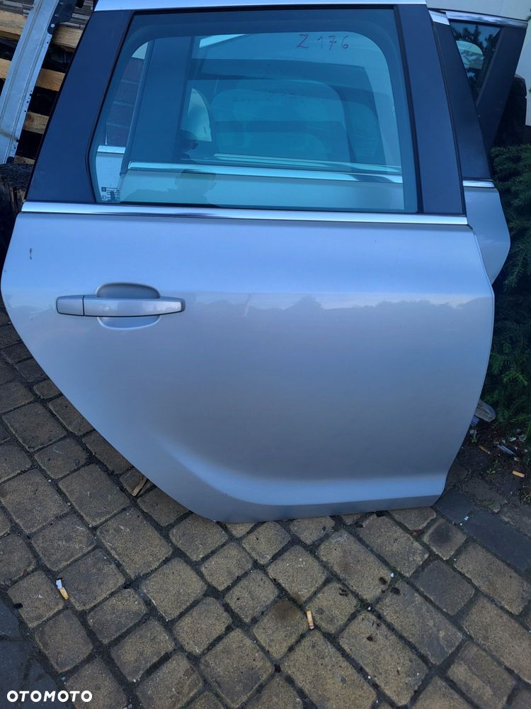 Drzwi tylne prawe opel astra j z 11r kombi lakier z176 kompletne