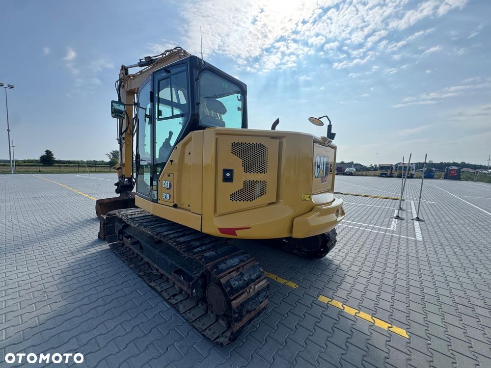 Caterpillar 310 - 7