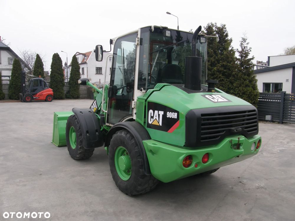 Caterpillar 906H 2009 łyżka widły ładowarka z Niemiec - 9