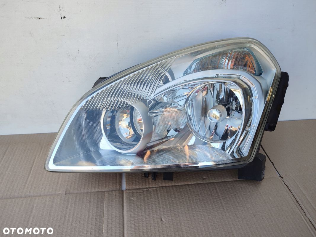 Lampa lewy przód XENON NISSAN QASHQAI I J10 EUROPA ORYGINAŁ - 1