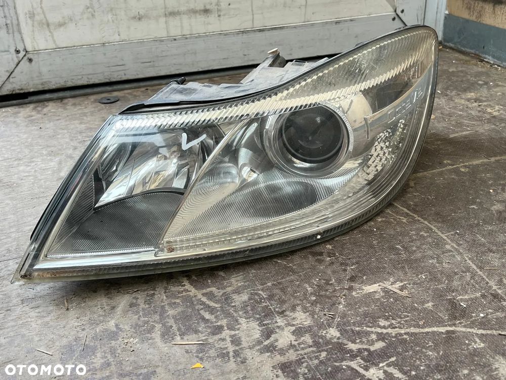 Lampa lewa lewy przednia przód Skoda Octavia II lift 1z1941015f