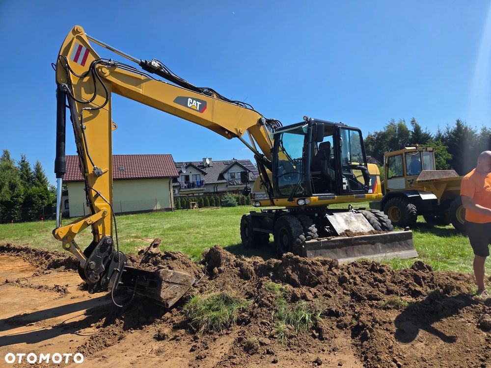 Caterpillar M313 D - 1