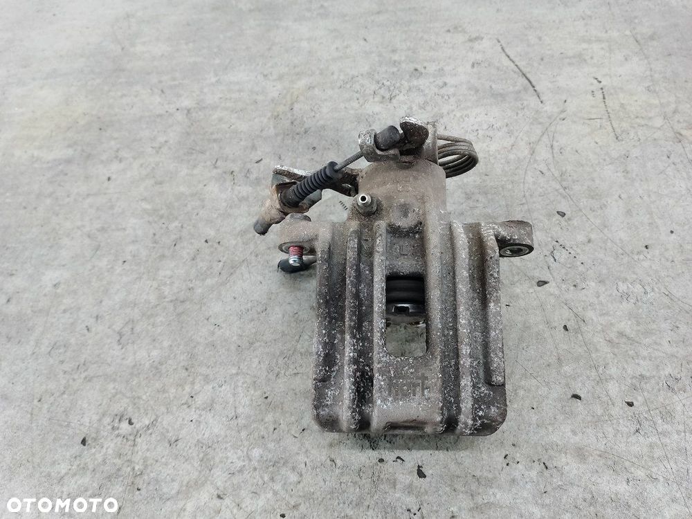 ZACISK HAMULCOWY LEWY TYŁ VW PASSAT B5 FL HART 1.9 TDI - 1