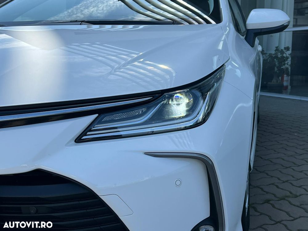 Toyota Corolla 1.8 HSD Business - 11