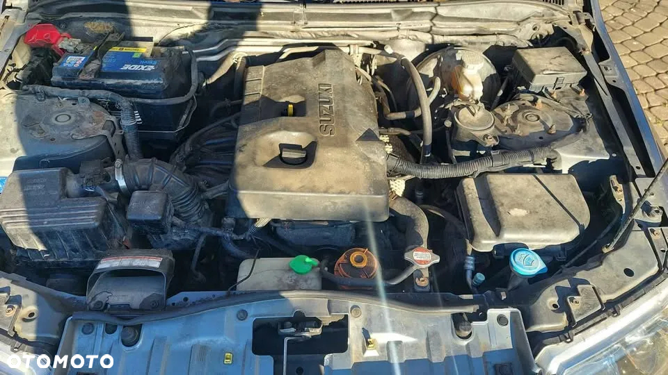 Suzuki Grand Vitara 2.0 - 18