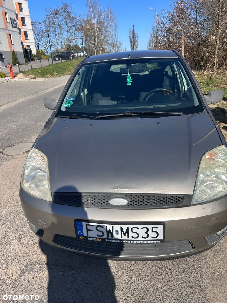 Ford Fiesta 1.4 Ghia - 8