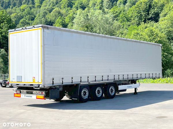 Krone Firanka Coilmulde // 9m // Alu Drzwi // Ażury // Oś podnoszona  //