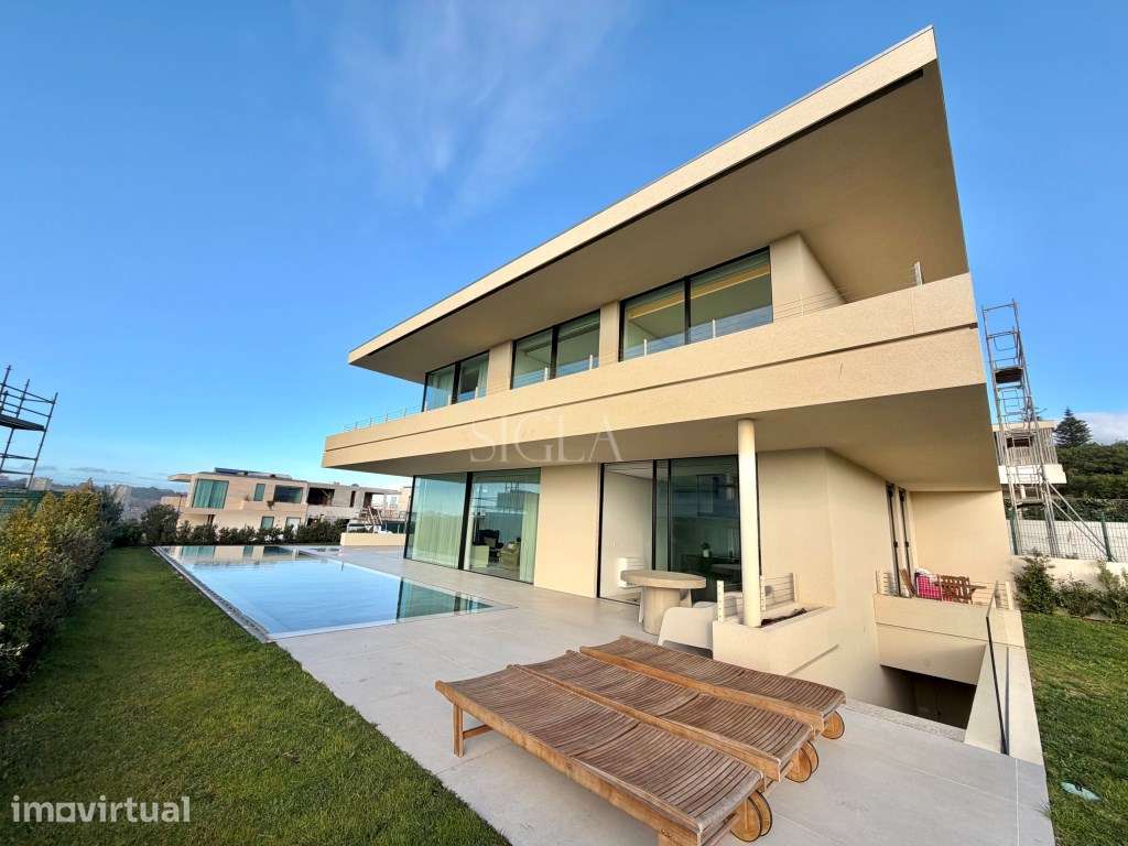 Moradia com Piscina e Vistas de Rio - Grande imagem: 2/50