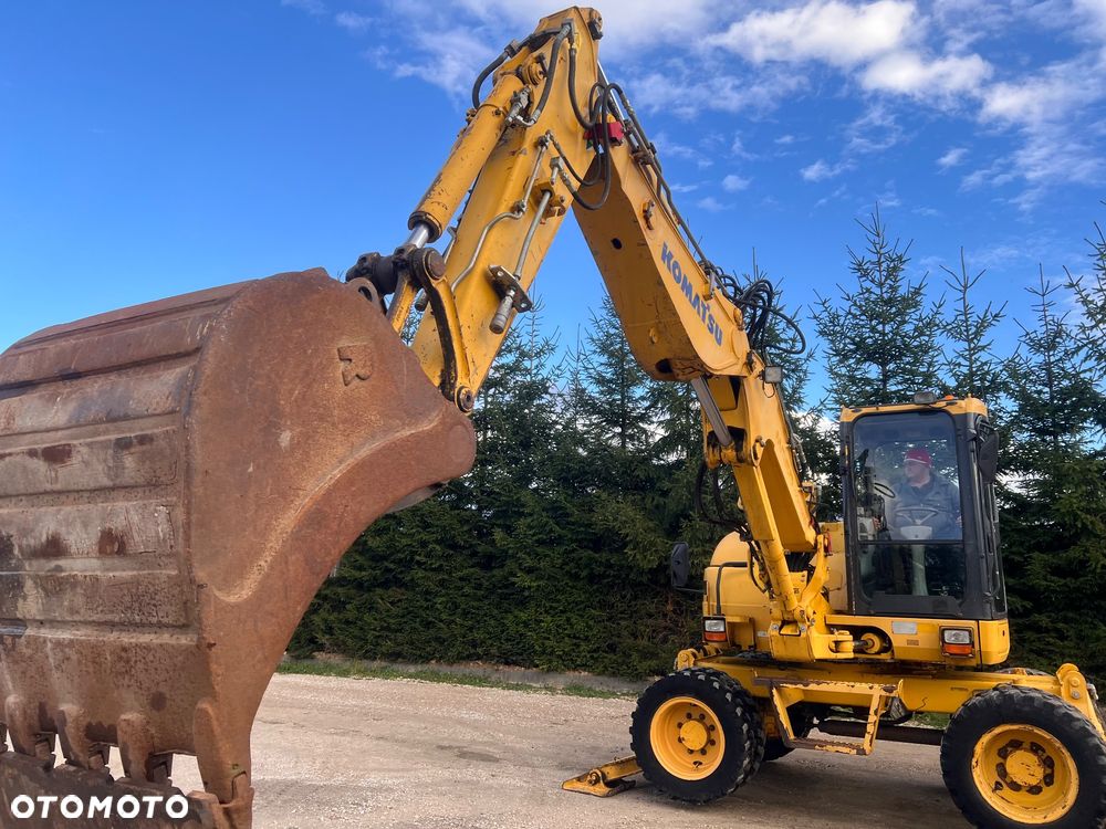 Komatsu Koparka kołowa KOMATSU 10ton PW98MR-8 4x4x4 plug podpory KLIMA 30km/h ramie Long 3xłamane skrętne 2012r bez DPF i ADBLUE 4cyl dodatk wyjścia hydr 51Kw 2osie skrętne pług stopy Cat TEREX Liebherr Wacker Pw 98 mr 8 11 prosto z importu - 30