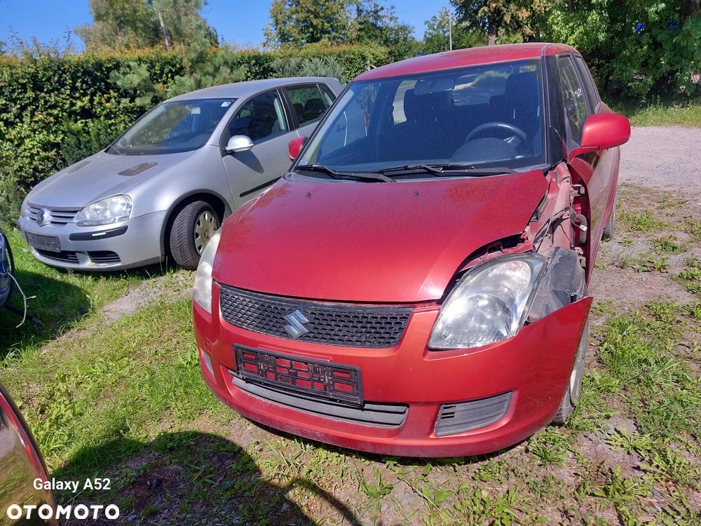 Zderzak SUZUKI SWIFT 1,3B 07R. maska,lampy,drzwi,klapa..... - 1