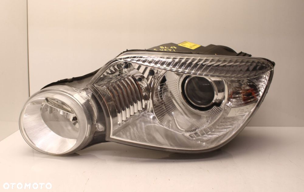 SKODA YETI I 09R- REFLEKTOR LAMPA LEWY PRZÓD LEWA PRZEDNIA XENON - 1