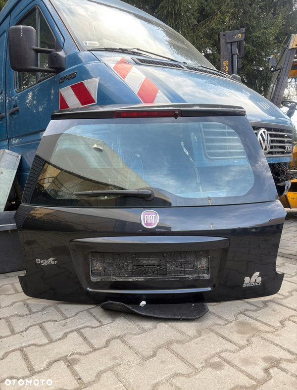 KLAPA TYLNA Z SZYBĄ SUZUKI SX4 FIAT SEDICI 12r CIEMNA SZYBA KOD ZCE