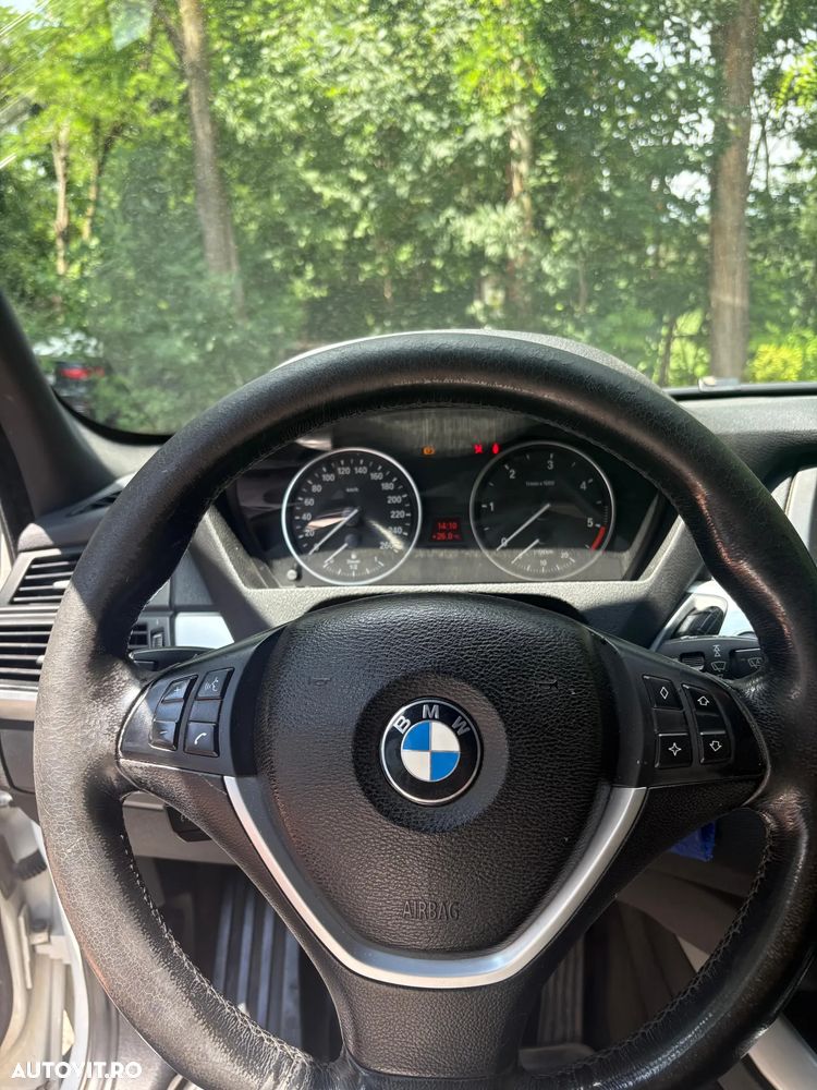 BMW X5 2009 — imagine 8