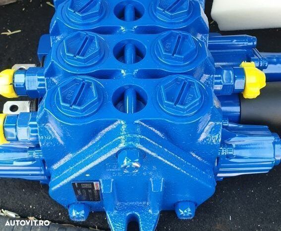 Distribuitor hidraulic buldoexcavator new holland - 1