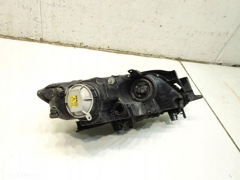LAMPA LEWY PRZÓD XENON MAZDA CX-7 EH1051040 10041028 - 3