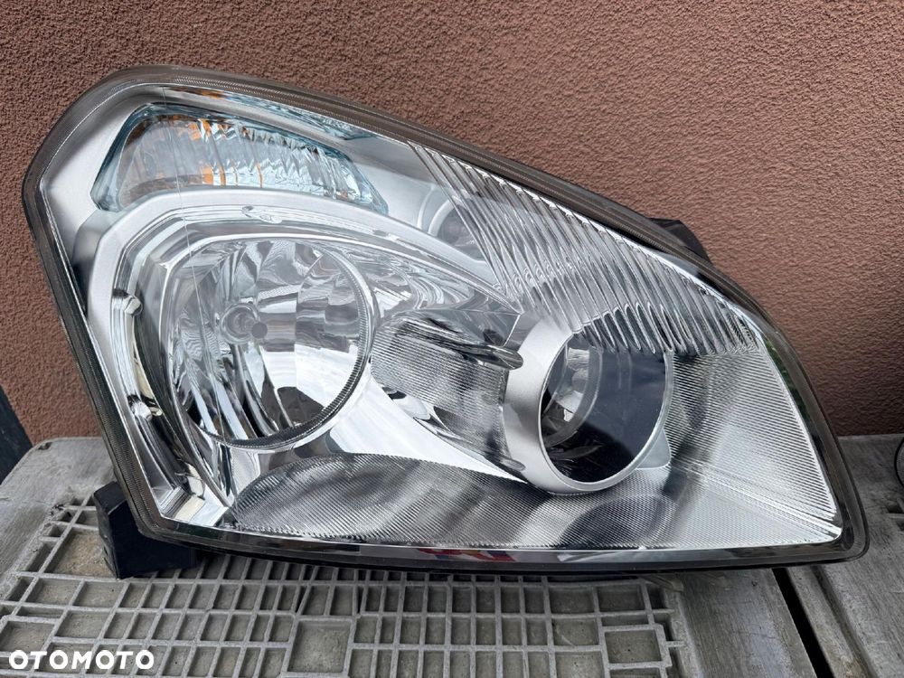 Lampa przednia NISSAN QASHQAI J10 ZWYKŁE KOMPLET EUROPA ORYGINALNE HELLA - 2