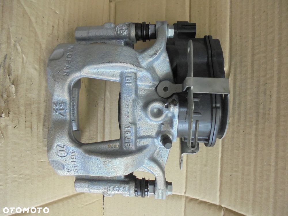 ZACISK HAMULCOWY TYŁ LEWY ELEKTRYCZNY FIAT DUCATO 2021- 52208198 - 1