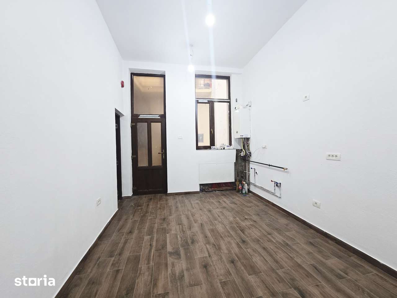 Apartament 3 camere cu centrală, parter – zonă centrală — fotografia 2