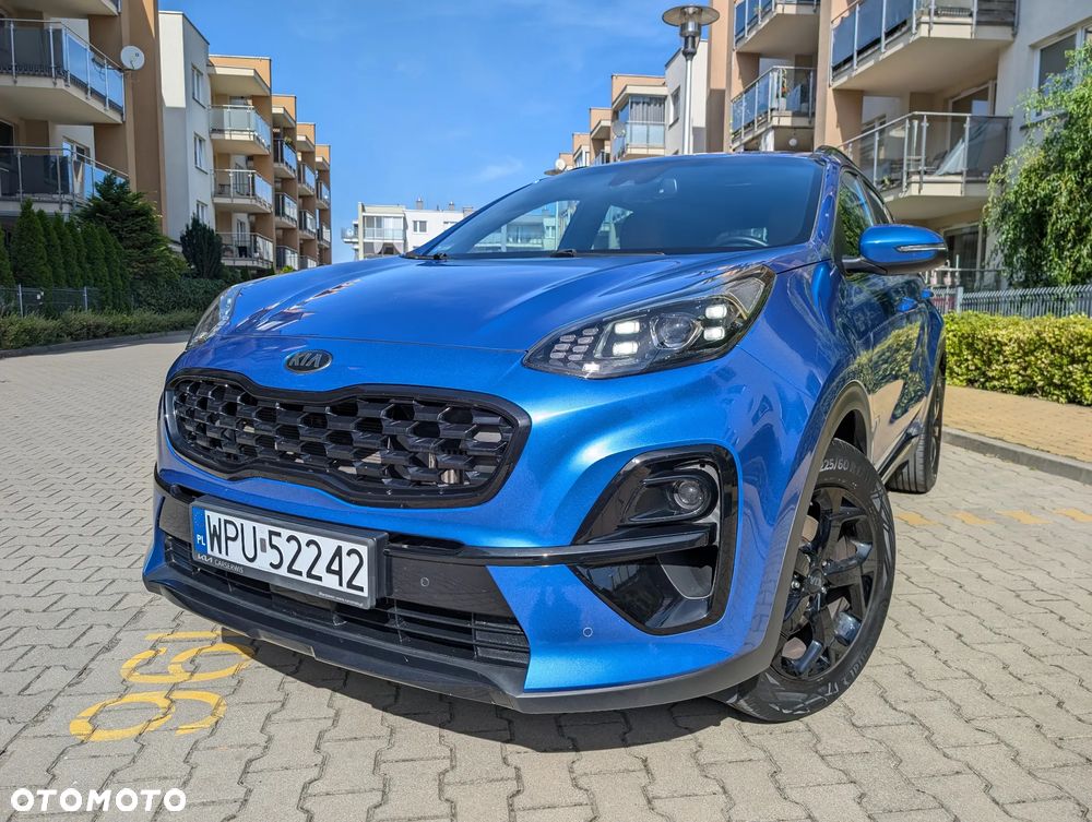 Kia Sportage - 4
