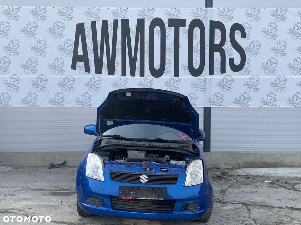 SUZUKI SWIFT 2005 *SAMOCHÓD NA CZĘŚCI* 4042 MASKA, LAMPA, DRZWI, LUSTERKO, ZDERZAK, GRILL, BŁOTNIK, KLAPA, BELKA, DESKA, FOTELE, KANAPA, ĆWIARTKA KIEROWNICA, TARCZE, ZACISKI, ZAWIESZENIE, KOMPLETNY PRZÓD, KOMPLETNY TYŁ, LICZNIK, ZEGARY, PRAWE LEWE PRZÓD TYŁ - 2