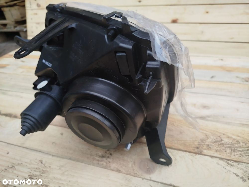 Lampa DACIA DUSTER reflektor prawa przód/przednia  Nowa - 7