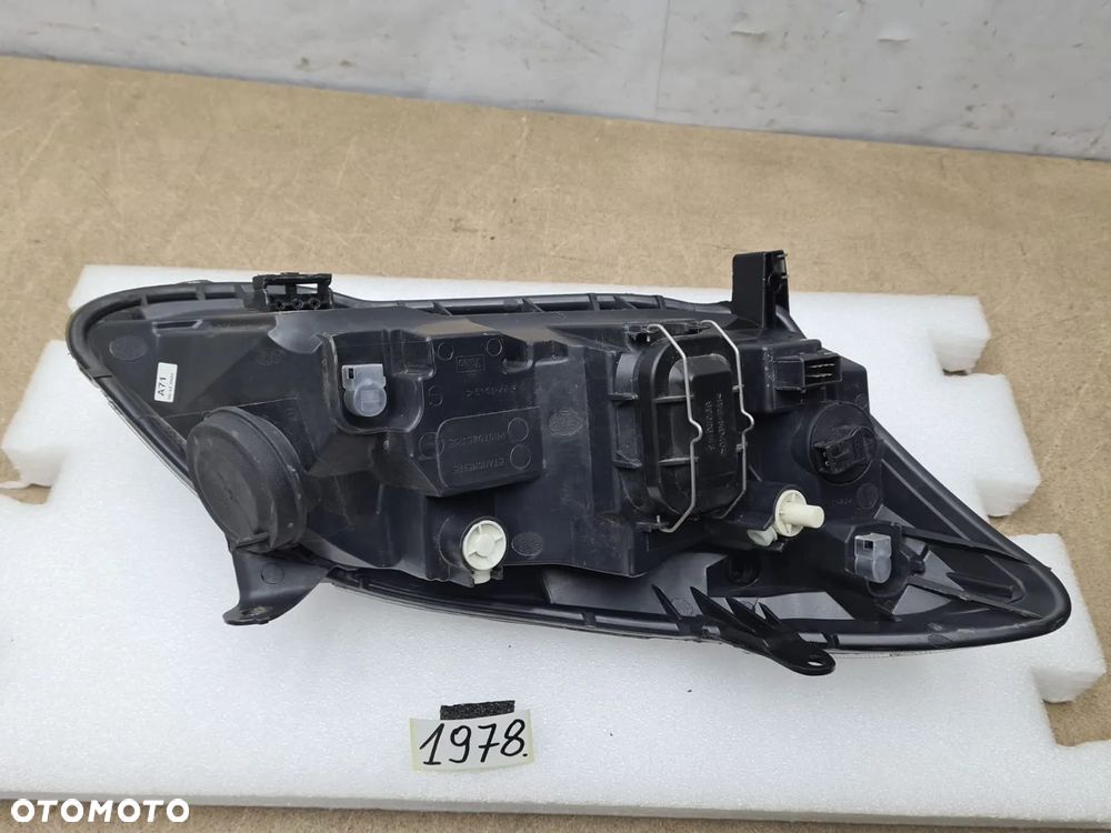 Toyota Corolla E12 04-07r 8117002380 reflektor lampa przednia przód Valeo - 7