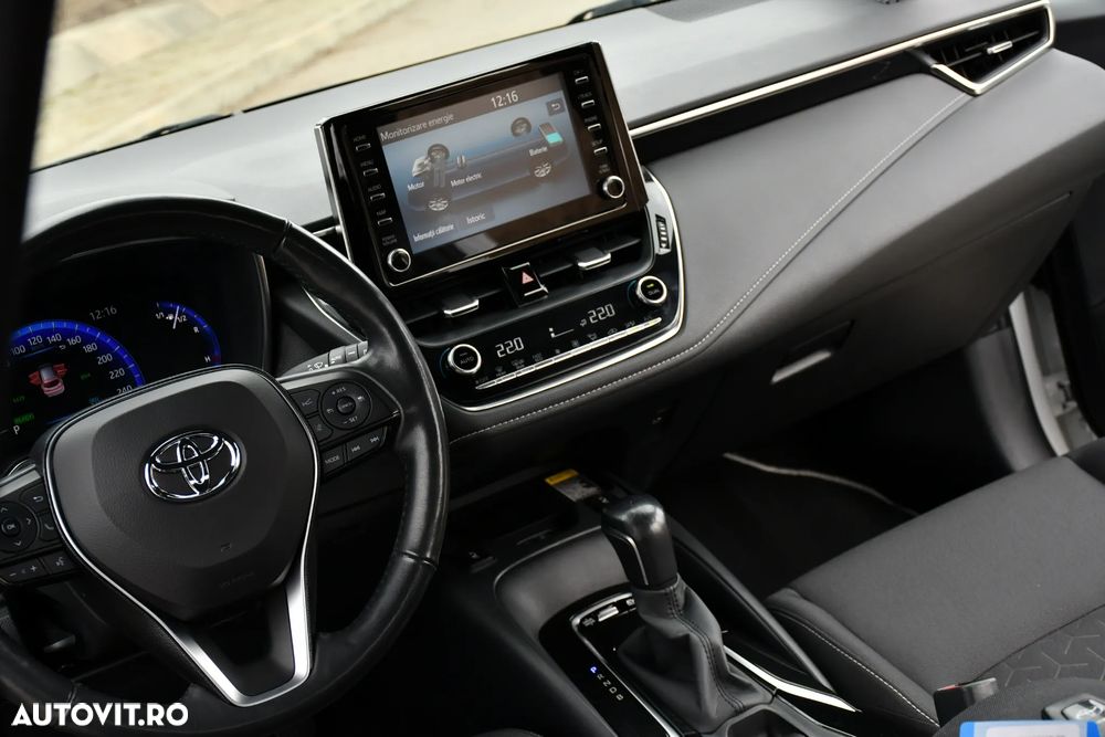 Toyota Corolla 1.8 HSD Exclusive - 28