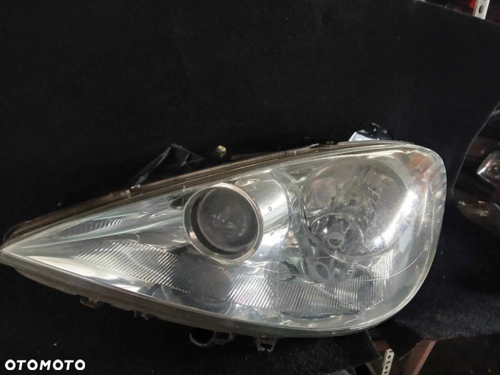 Peugeot 308 Lampa przednia lewa. - 1
