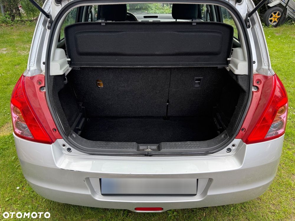Suzuki Swift 1.3 Club - 8