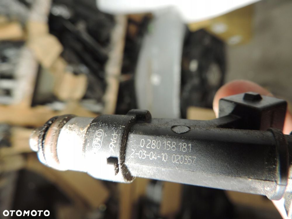OPEL CORSA D 1.4 A14XER LISTWA WTRYSKOWA 55562258 - 4