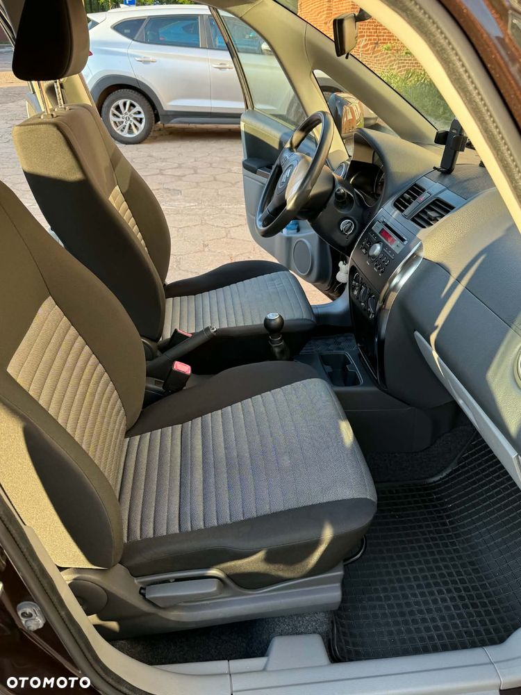 Suzuki SX4 1.6 Comfort Plus - 7