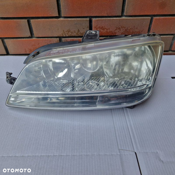 ORYGINAŁ FIAT IDEA MULTIPLA II REFLEKTOR LEWY 51780723