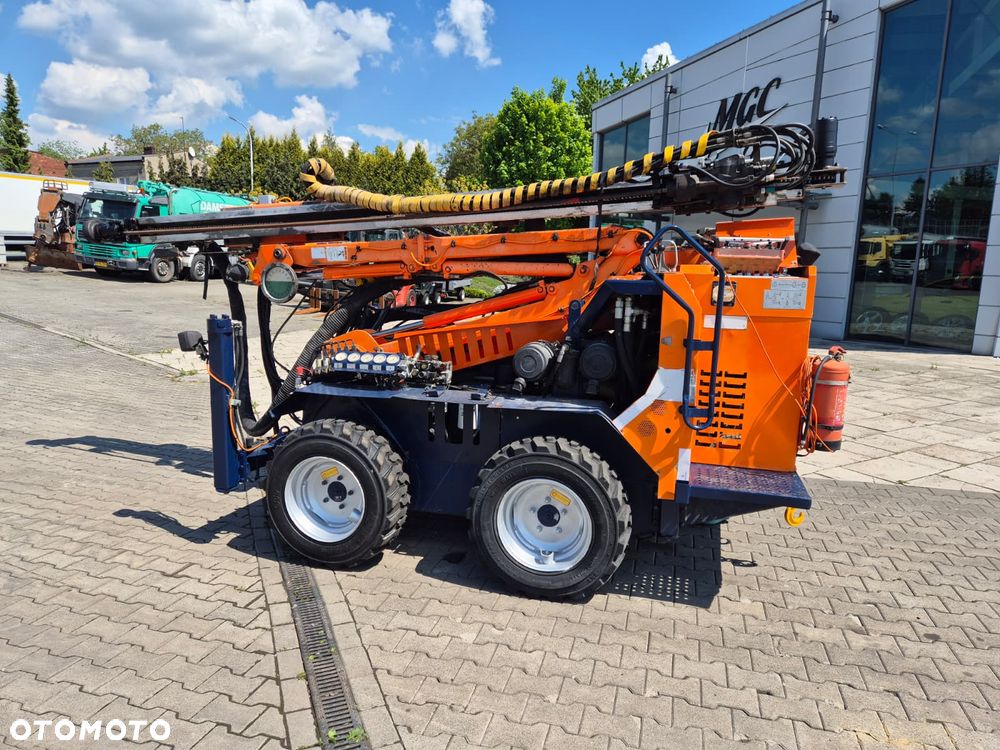 Sandvik Tamrock COMMANDO 120R 4X4 / WIERTNICA DO SKAŁ / SERWISOWANA / 1 WŁ / PEŁNA DOKUMENTACJA / WIELE CZĘŚCI ZAMIENNYCH / ZDALNE STEROWANIE / SILNIK CAT / TRANSPORT / NOWE OPONY - 10