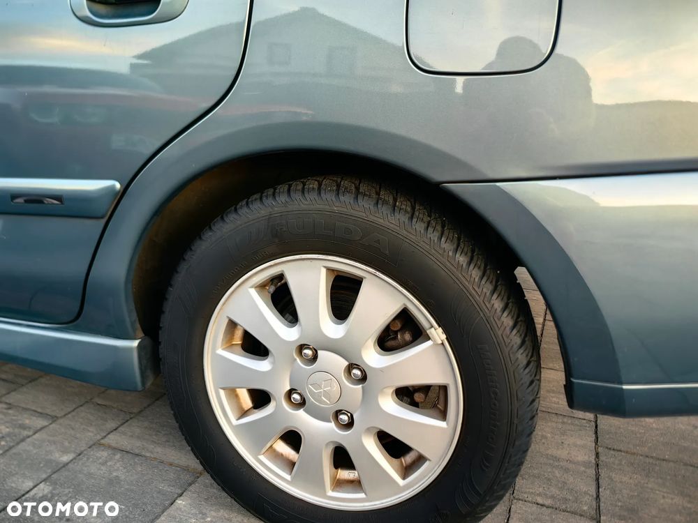Mitsubishi Carisma 1.8 GDI Automatik Comfort Plus - 23