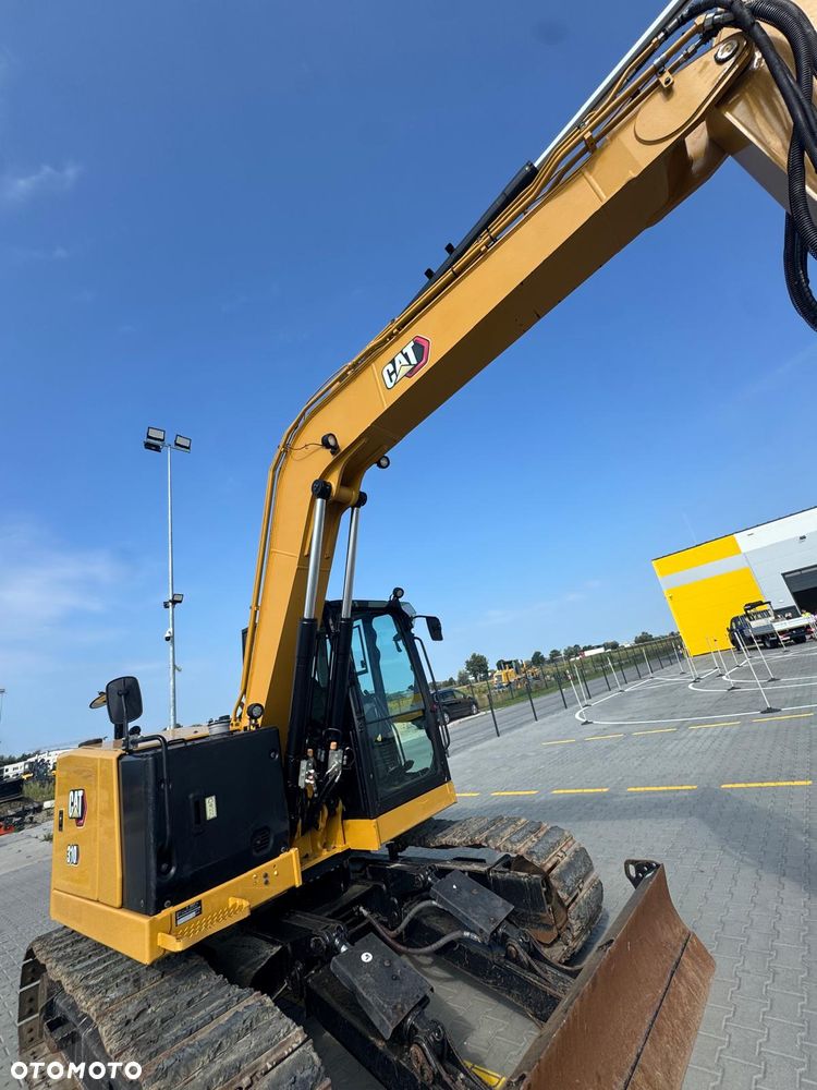 Caterpillar 310 - 12