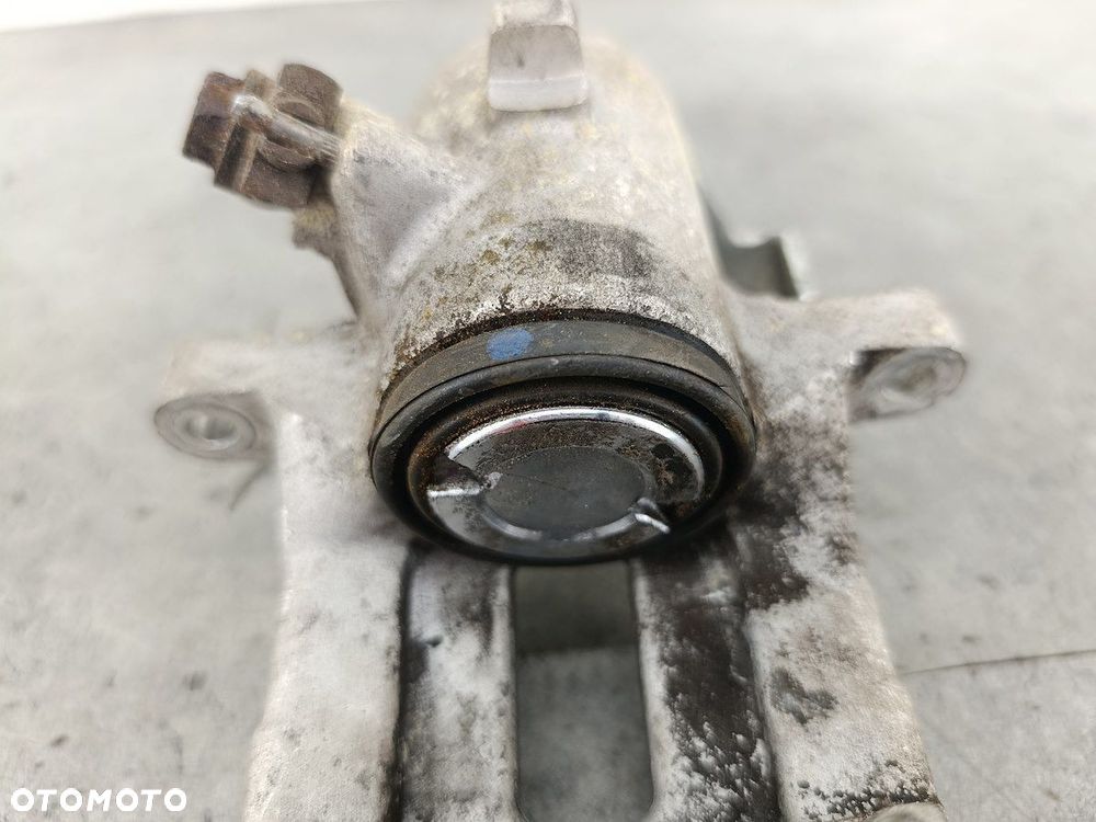 ZACISK HAMULCOWY PRAWY TYŁ AUDI A4 B6 23SKV324 SKV 1.9 TDI - 6