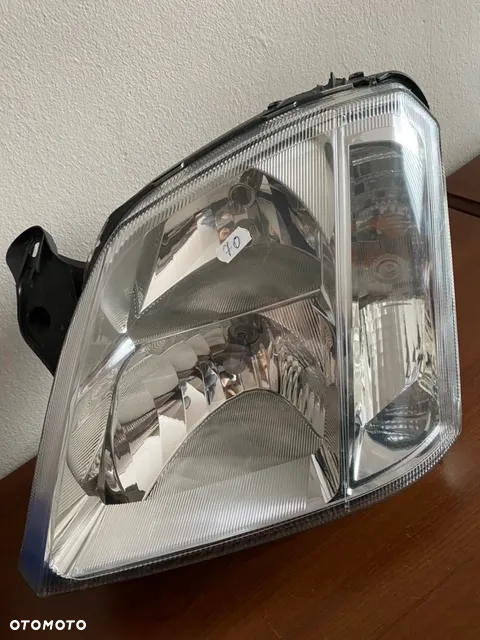 REFLEKTOR LAMPA LEWA PRZÓD 93175364 OPEL MERIVA A