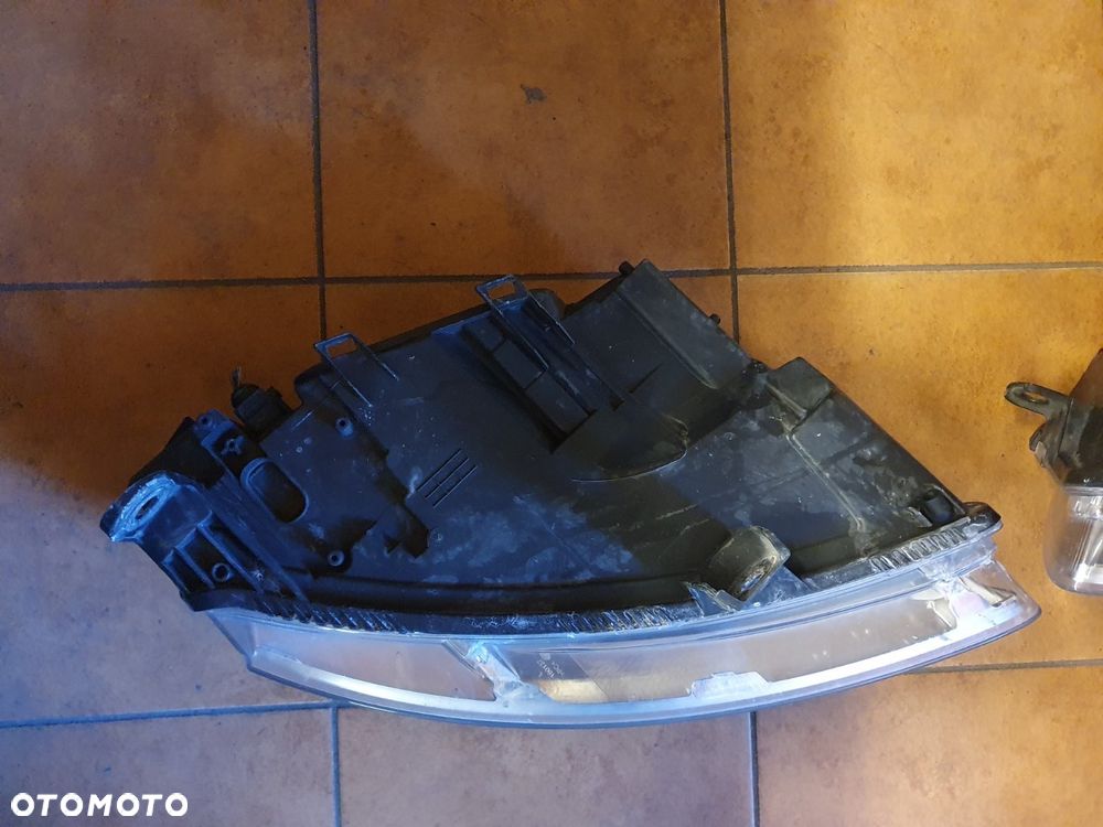 REFLEKTOR LEWY AUDI A6 C6 H7 ZWYKŁY EUROPA - 10