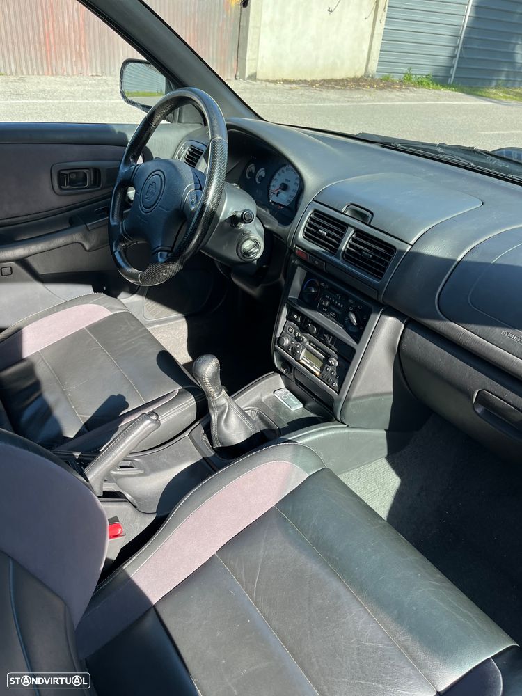 Subaru Impreza 2.0 GT 4x4 AC+TA+ABS - 11