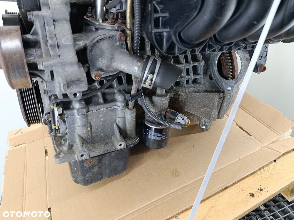 SILNIK TOYOTA AVENSIS II T25 E1Z-T72 1.8 16V - 9