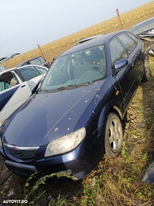 Dezmembrez Mazda 323 - 4