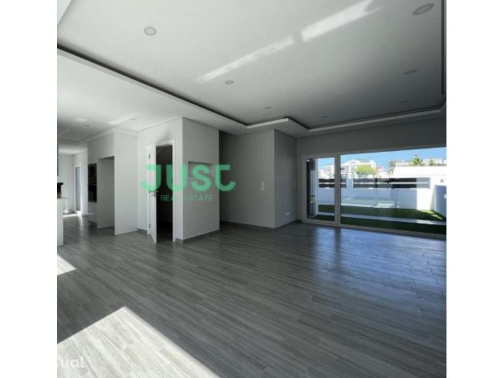 Moradia T4 com áreas generosas e localização de excelência -margem sul - Grande imagem: 3/11